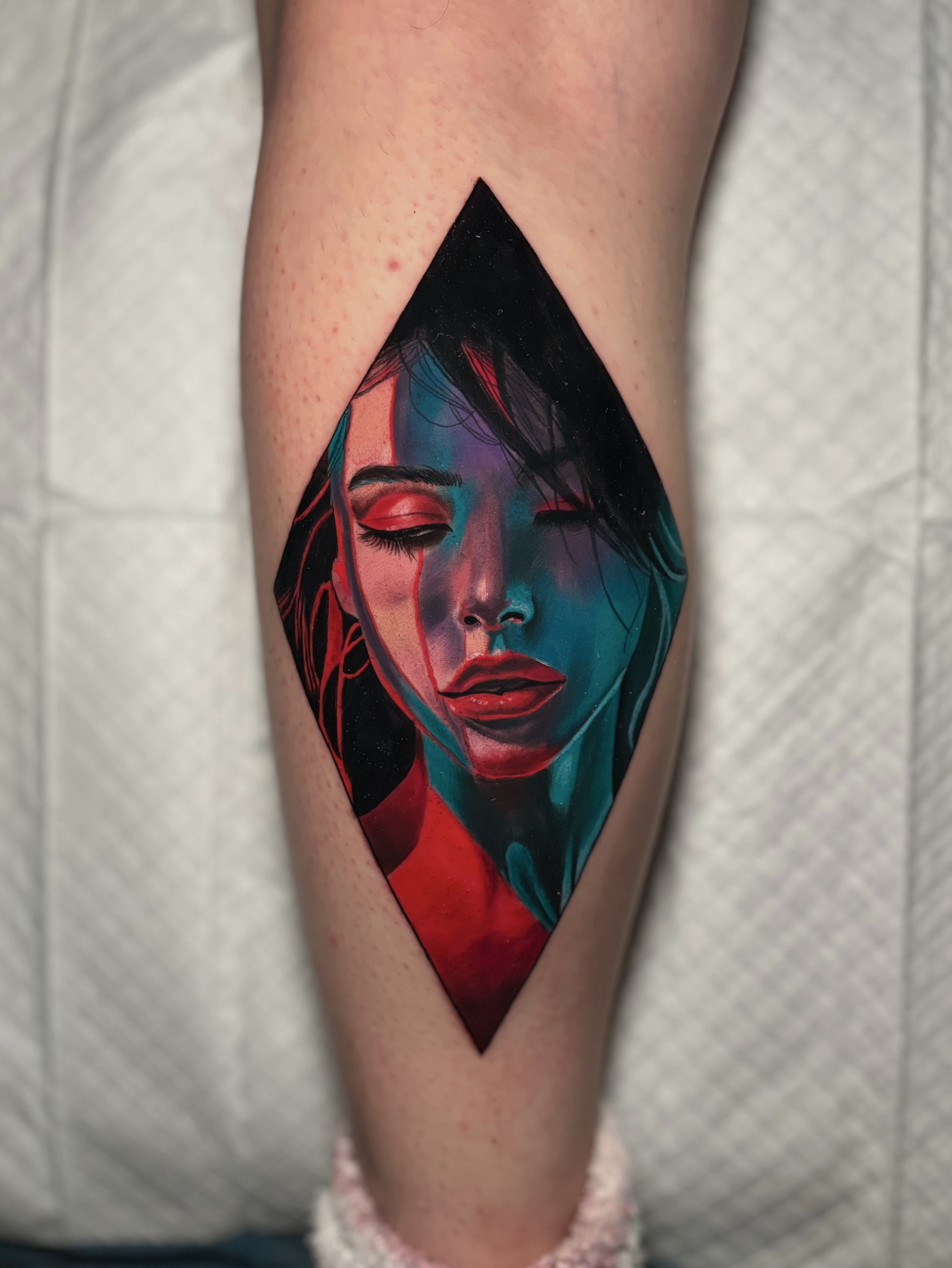 Colorful stylized woman portrait tattoo